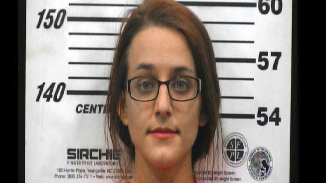 Woman drives into church, stabs husband for worshipping NASCAR race?