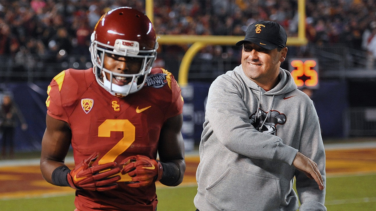 Did Sarkisian compare Adoree' Jackson to exiled USC star Reggie Bush?