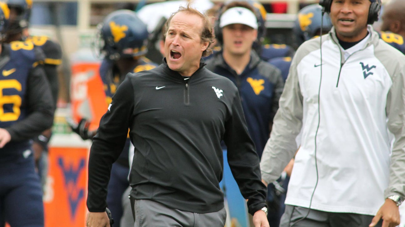 Holgorsen for Big 12 title game, thinks absence 'hurt' conference in 2014
