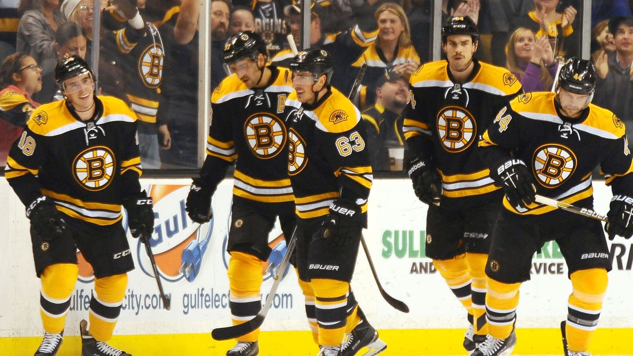 Bruins score three quick goals in third to doom Oilers