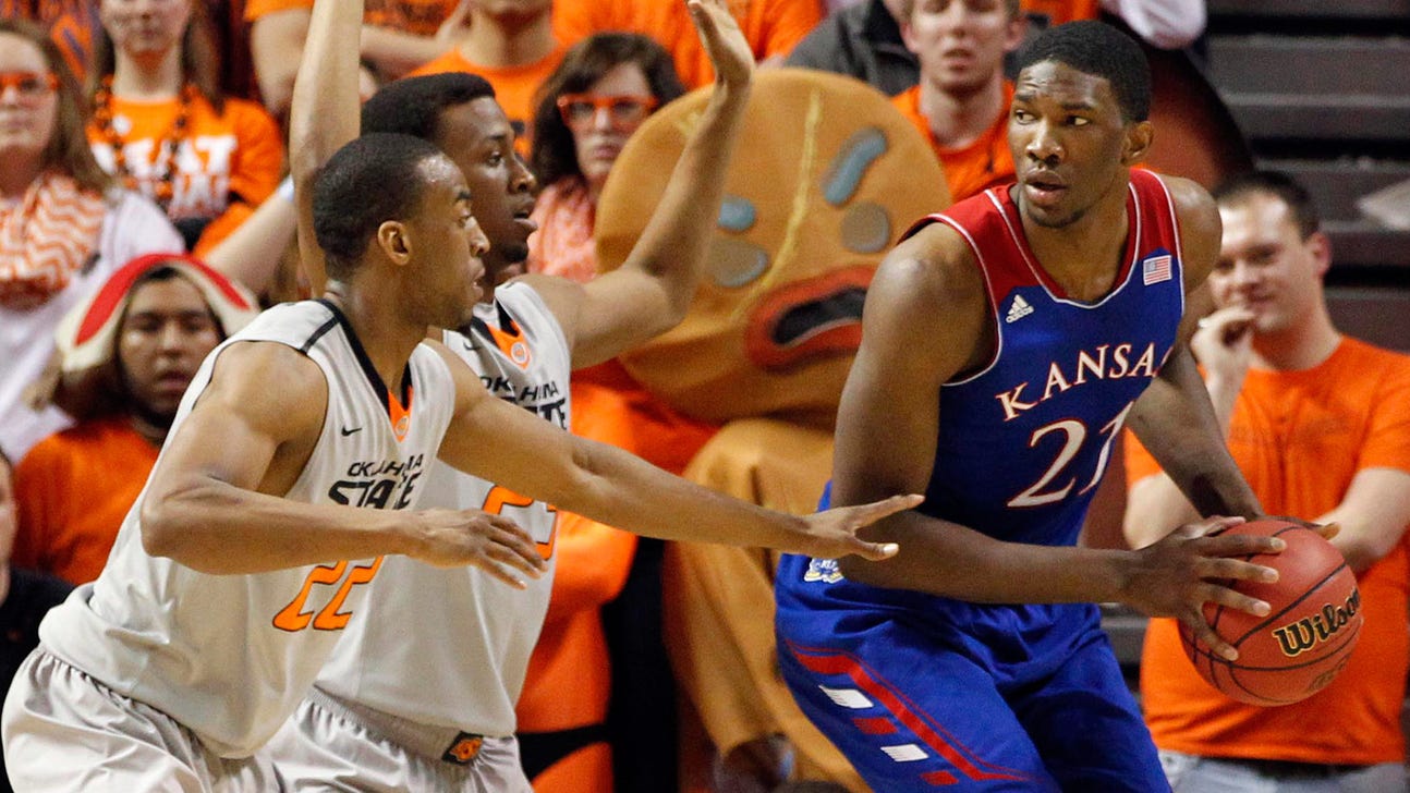 Prep coach says KU's Embiid, now out for two games, has had back problems before