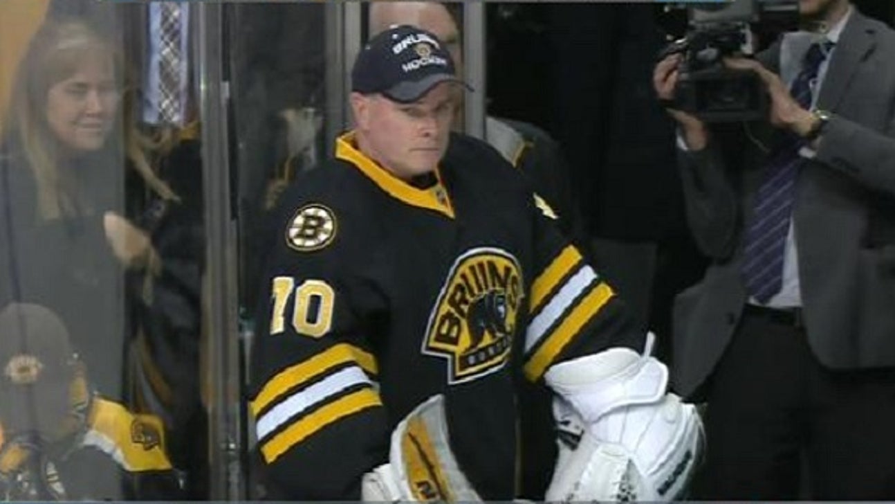 Bruins coach suits up as backup goalie