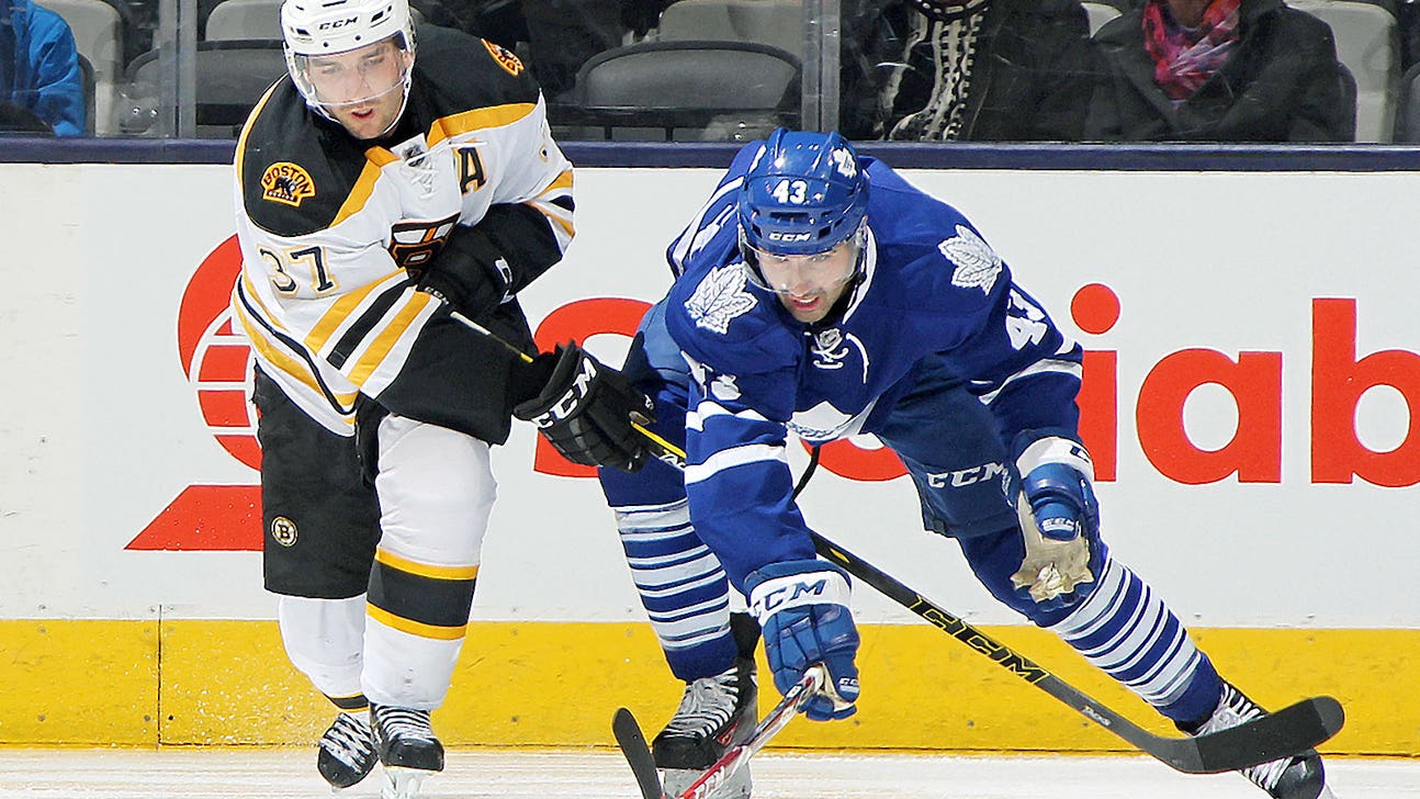 Bergeron records his 500th point as Bruins coast past Maple Leafs