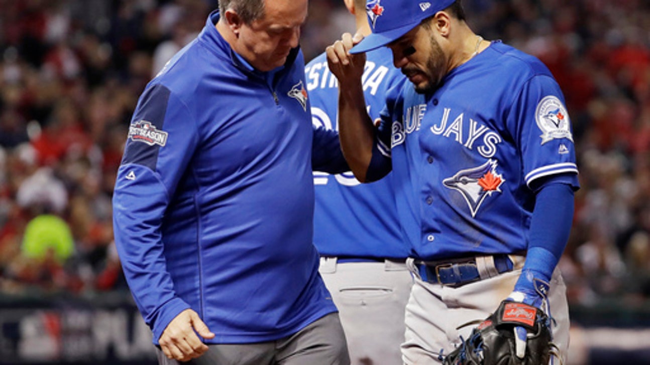 Jays' Devon Travis leaves for MRI; team adds Smoak to roster