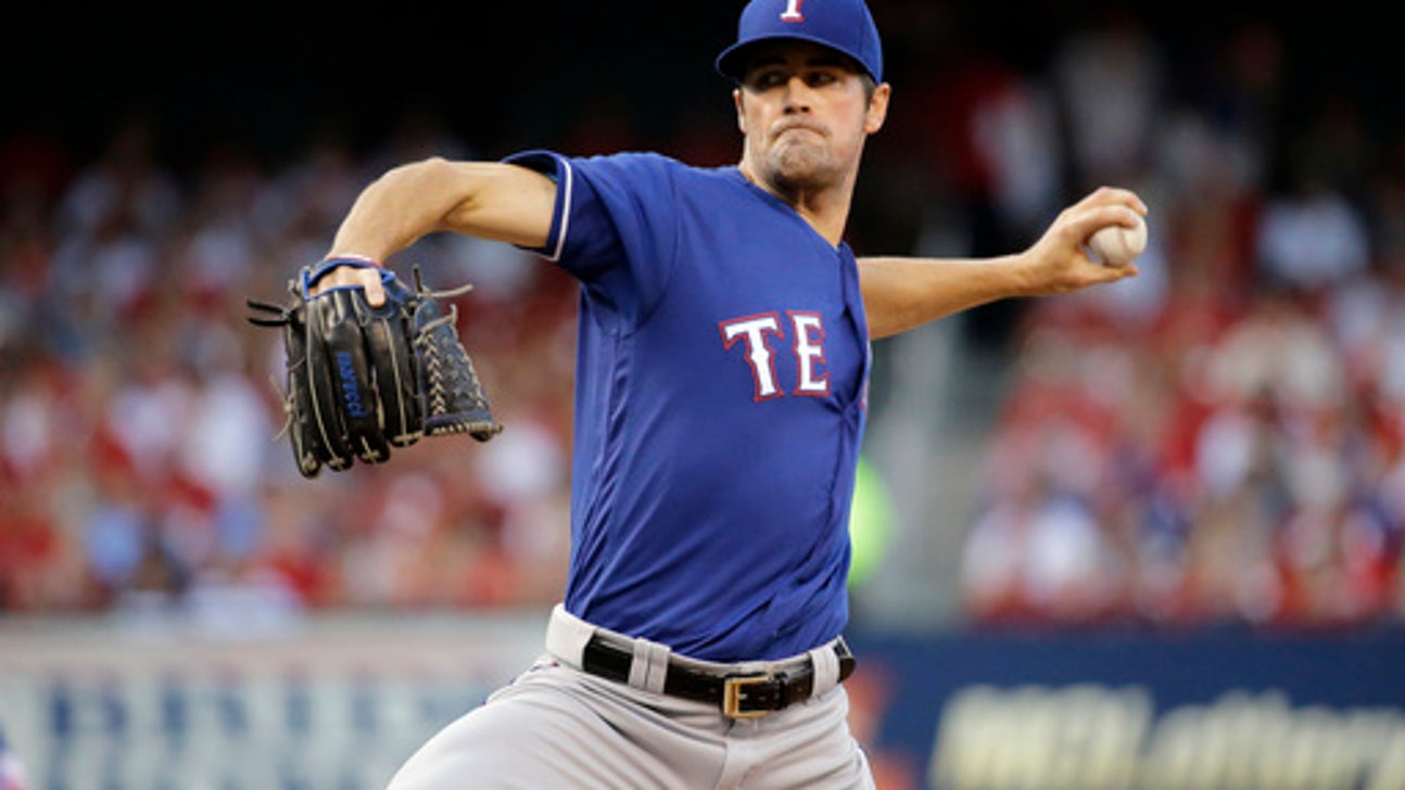 Hamels pitches Rangers to 1-0 win over Cardinals