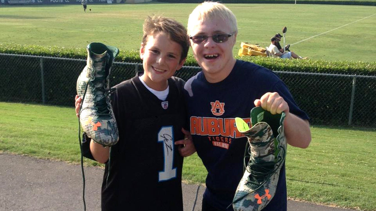 Cam Newton gives two kids signed pair of cleats at Panthers camp