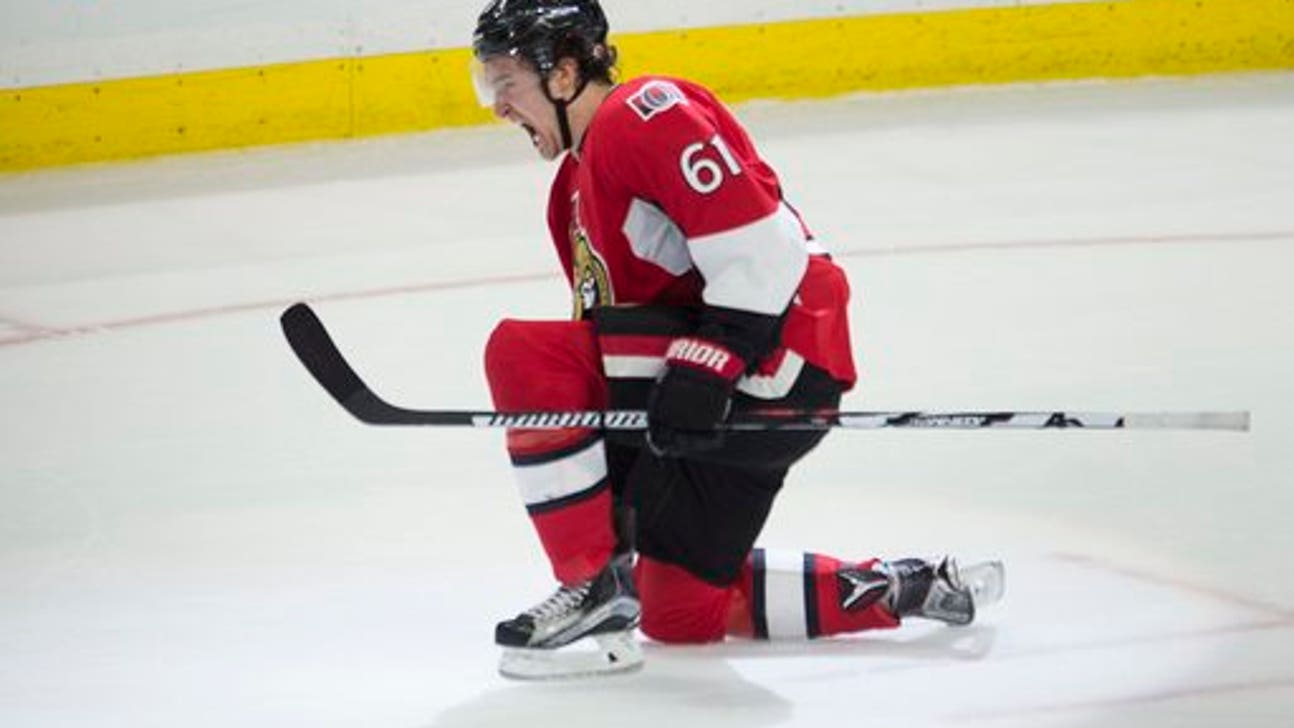 Stone scores in OT to lift Senators to 2-1 win over Bruins