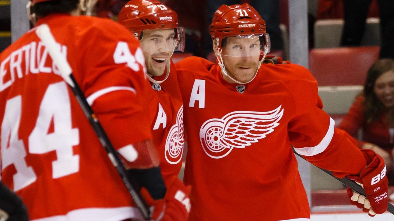 Wings edge Flames in OT