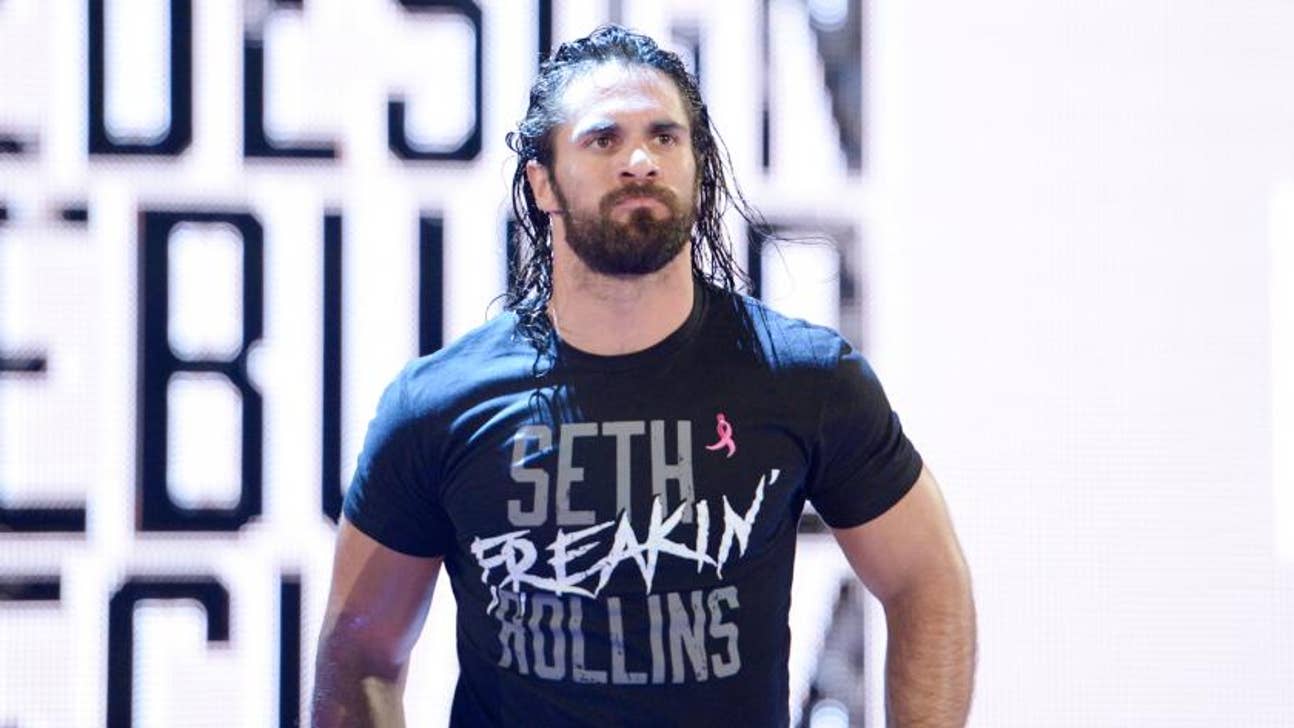 Seth Rollins Destroys Kevin Owens with Powerbomb Through Two Tables (Video)
