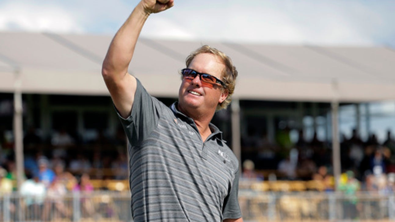 Woods making progress toward a return; no date set