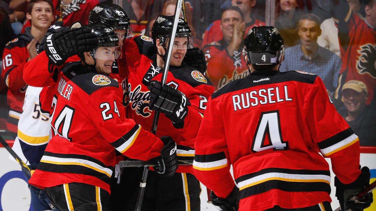 Three-goal third period propels Flames past Predators