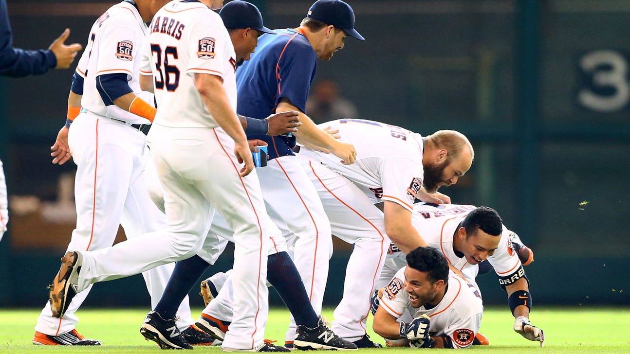 Watch: Altuve gets tackled after walk-off nets Astros big victory
