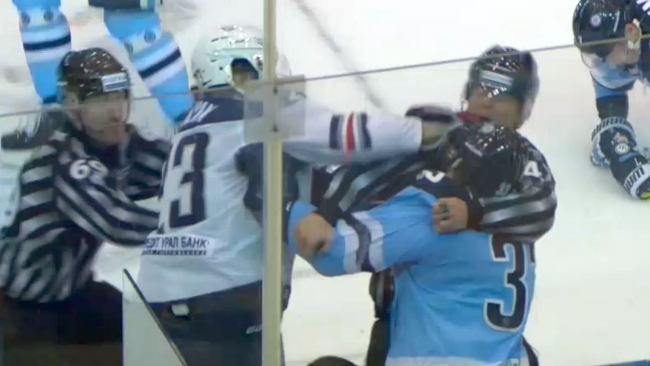 KHL player accidentally punches ref in the face during scuffle
