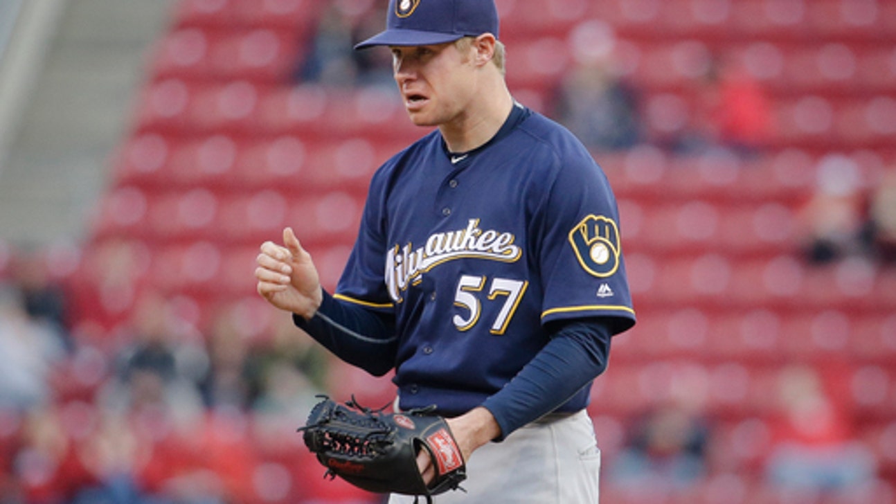 Reds beat Brewers 9-5 despite bullpen extending bad streak
