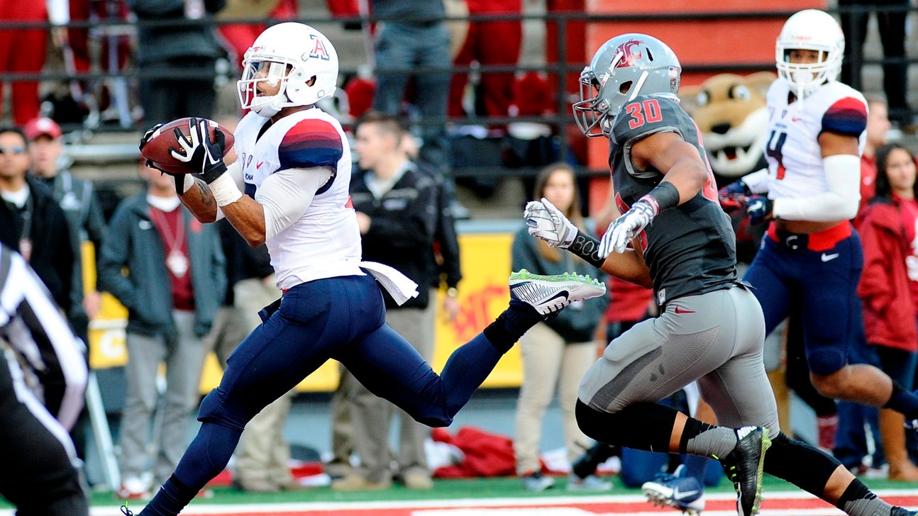 Solomon, No. 15 Wildcats rout Washington State