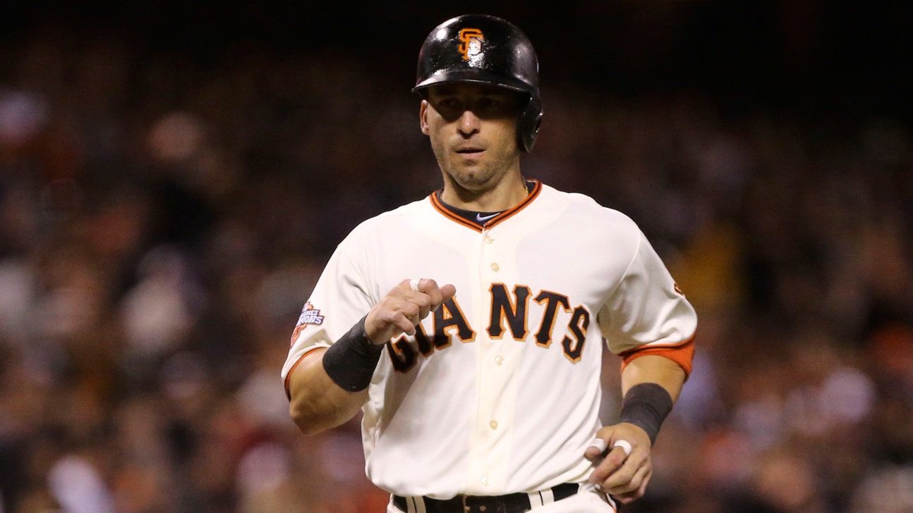 Giants take Marco Scutaro off roster, plan to keep him during rehab