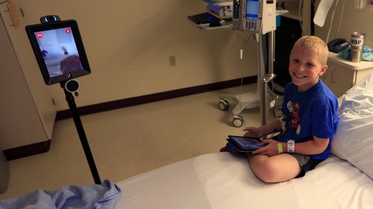 Robot allows hospitalized kids to 'attend' Sporting KC matches virtually