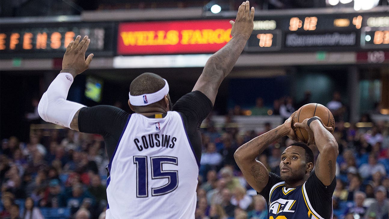 DeMarcus Cousins inadvertently gives Utah's Trevor Booker a concussion