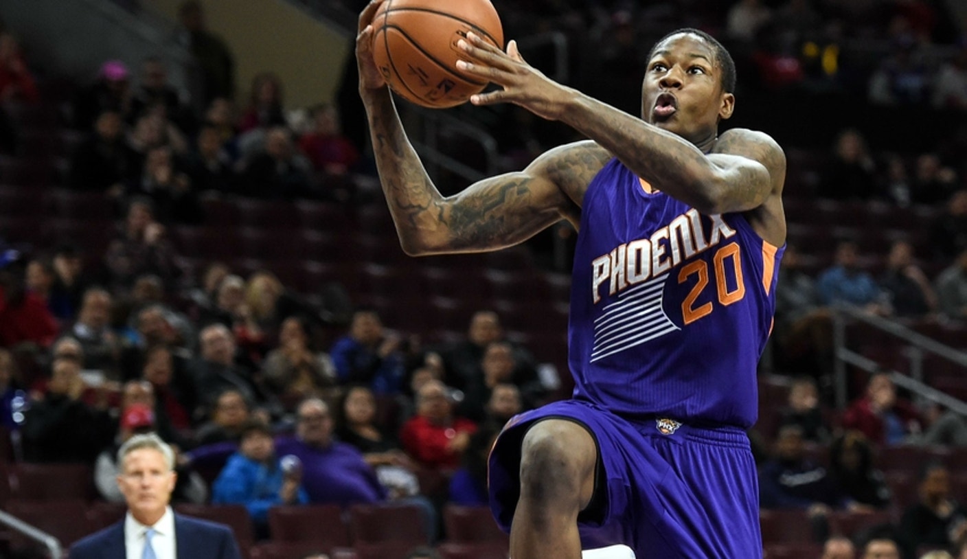 New Jersey Nets' and Eastern Conference All Star Stephon Marbury, right,  makes what was to be the winning shot against Phoenix Suns and Western  Conference All Star Jason Kidd, left, as the