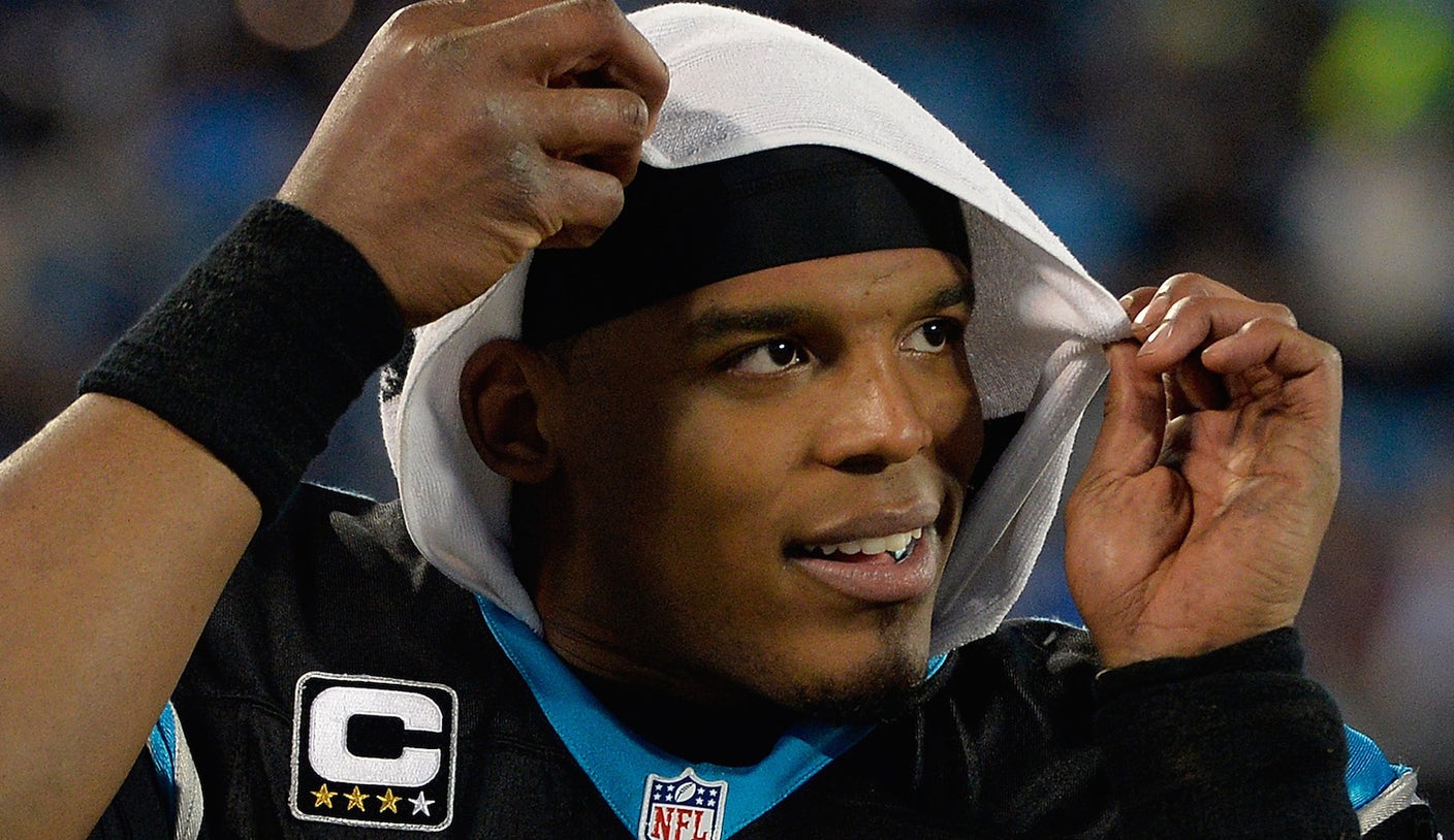 Cam Newton wore a huge hat and bleached beard to his first training camp  presser