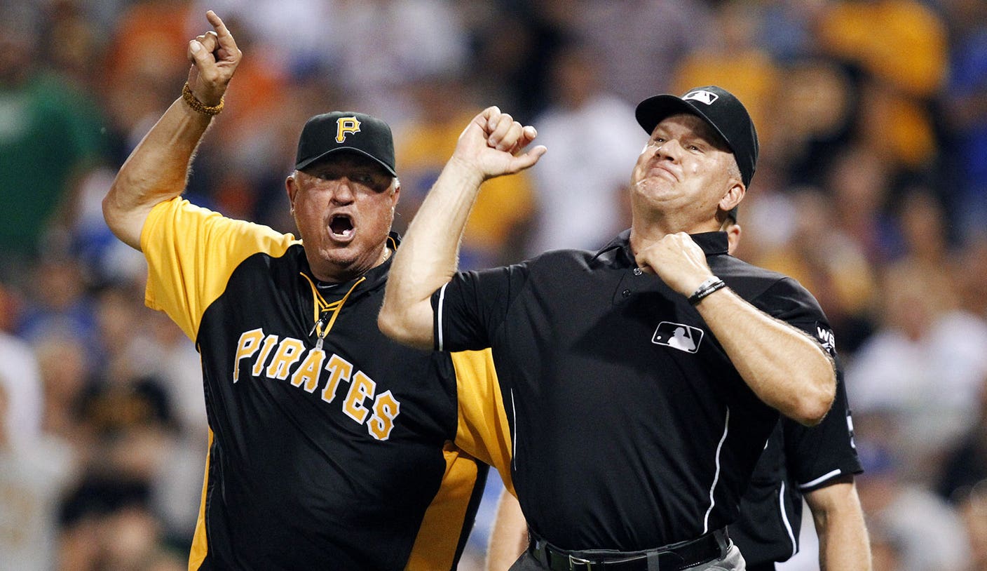 Pittsburgh Pirates manager Clint Hurdle shows the All-Star jersey