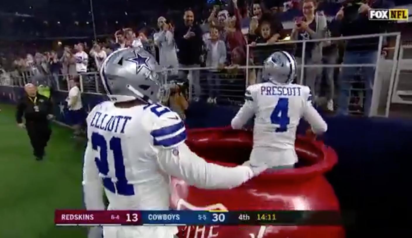 WATCH: Prescott jumps in Salvation Army Red Kettle After Remarkable  Touchdown Run