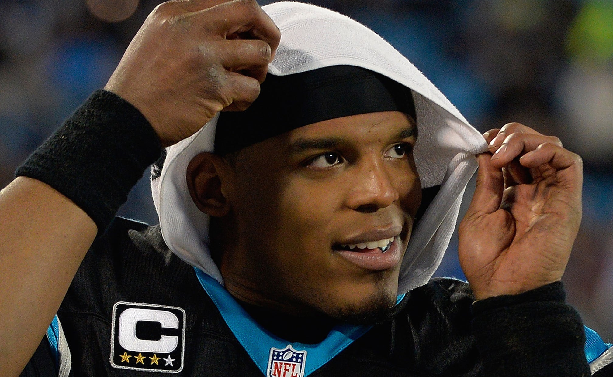 Cam Newton wore a huge hat and bleached beard to his first training camp presser | FOX Sports