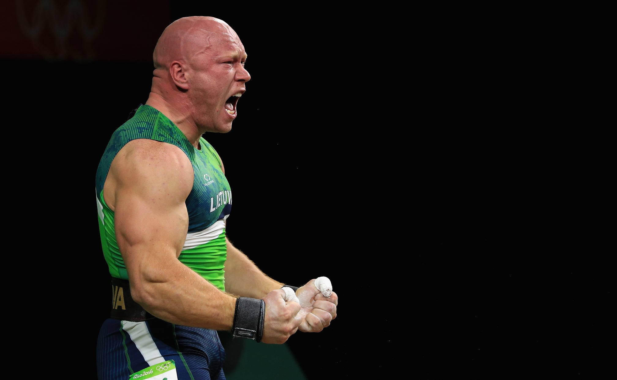 Olympic weightlifter celebrates medal with an incredible backflip FOX
