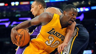 Next Story Image: Watch Julius Randle throw down a vicious reverse dunk on Kenneth Faried