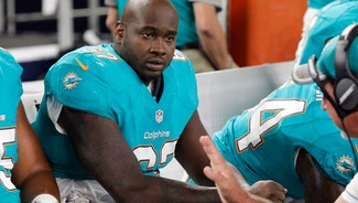 Next Story Image: Dolphins say rookie Tunsil hurt his ankle in the shower