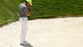 Next Story Image: The Latest: Threesomes off 2 tees in US Open bid to catch up