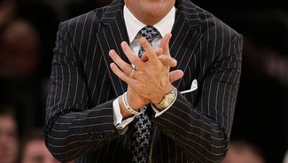 Next Story Image: The Latest: Top-50 wins boost Michigan, Syracuse