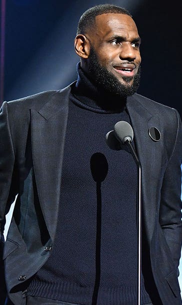 Watch LeBron deliver $1.3 million in cash to a family that ...
