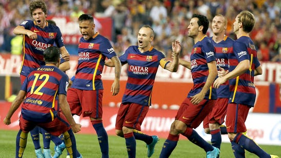 Messi, Neymar lead Barcelona past Atletico to La Liga summit