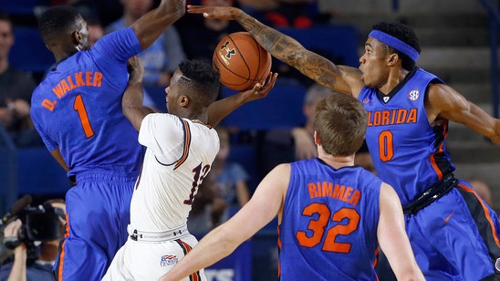 Florida overcomes slow start to beat Navy in Mike White's first game