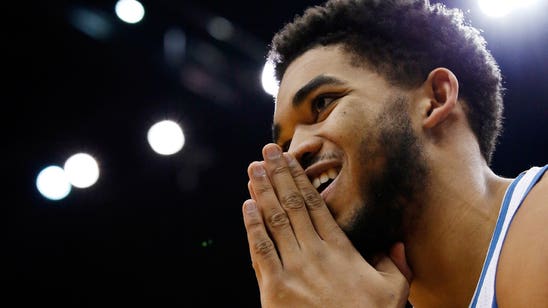 Towns thrives in NBA despite passings of coach, mentor