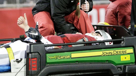 Washington St. QB carted off with head injury in win