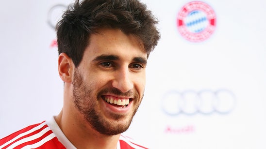 Bayern Munich's Javi Martinez supporting migrants
