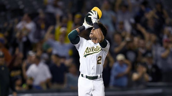Khris Davis shoots his helmet like a basketball after hitting walk-off grand slam