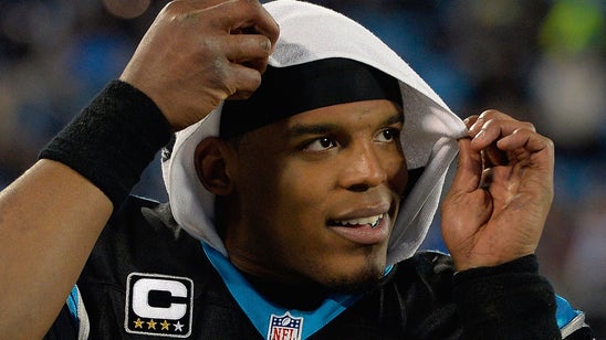Cam Newton wore a huge hat and bleached beard to his first training camp presser