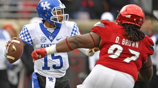 Kentucky Football's Johnson Leads Cats to Upset of Cards