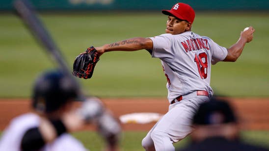 Martinez, Holliday help Cardinals to fourth straight win