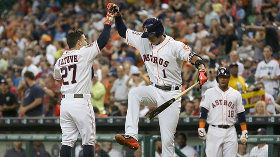 In battle of AL's best, Astros strike first in win over Royals