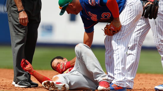 Cardinals' Pham leaves game with injury on headfirst slide