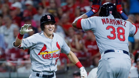 Edman's grand slam lifts Cardinals to 7-4 win over Reds