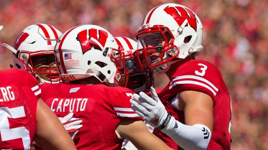 WATCH: Badgers' McEvoy snags INT off teammates helmet