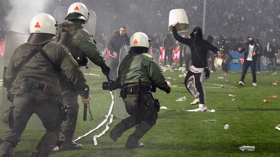 Greek Cup semifinal abandoned due to fan violence