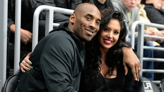 Watch Kobe and his wife smooch on the Kiss Cam at a Kings game