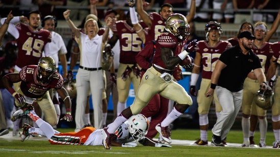 Dalvin Cook turns in electric outing to help FSU hold off Miami