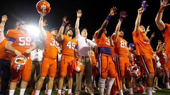 Clemson players lend a hand to Habitat for Humanity